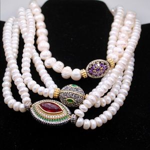 Pearl necklace with purple stones